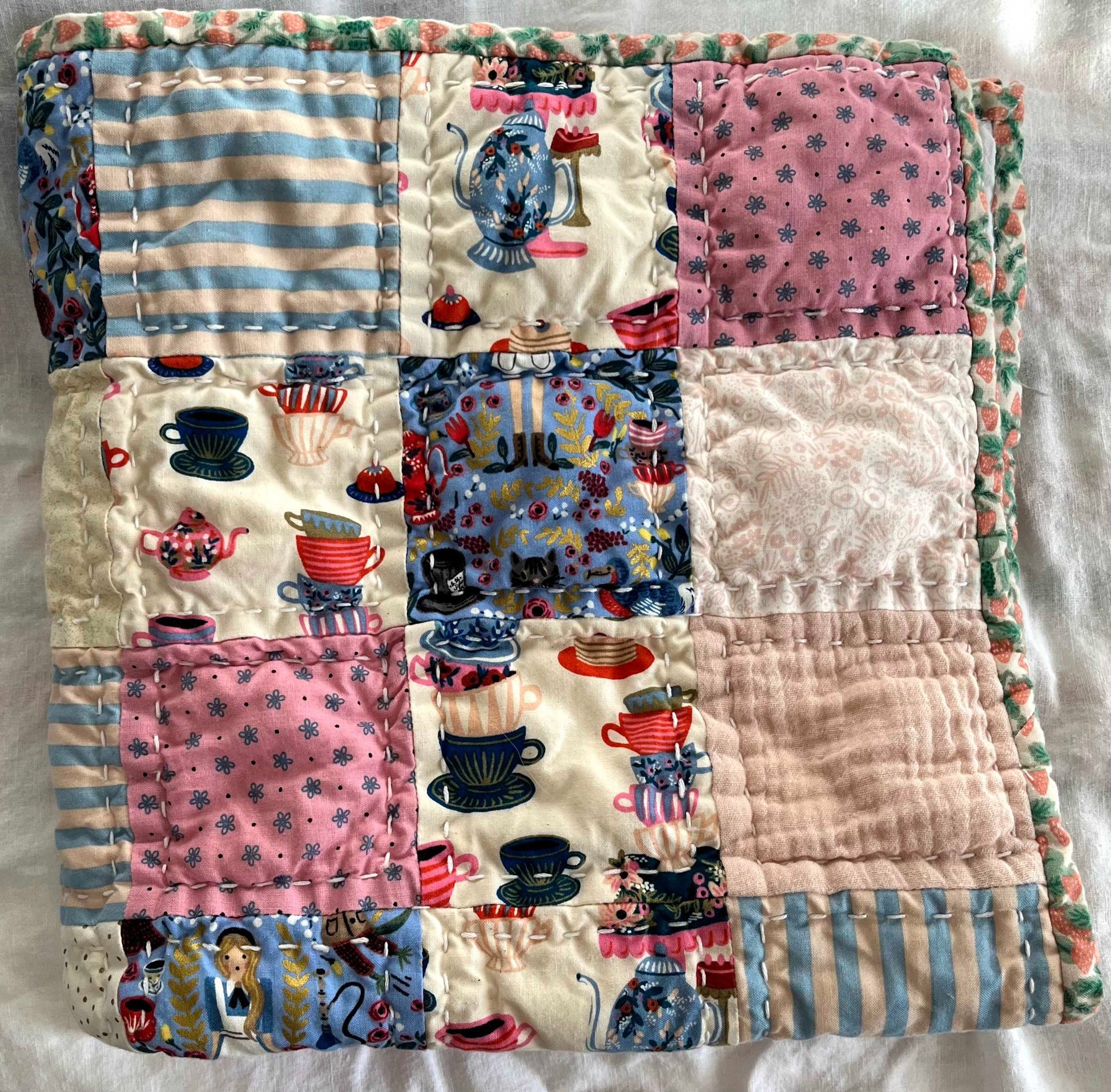 685bf416c0f3f4673dfe2462_alice-in-wonderland-quilt_1788033403205.jpg