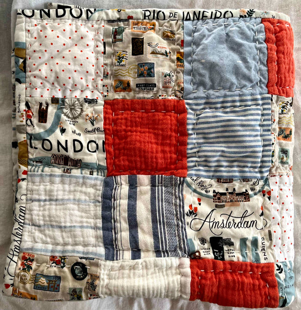 685bf416c0f3f4673dfe2462_little-traveler-orange-quilt_1788033993053.jpg