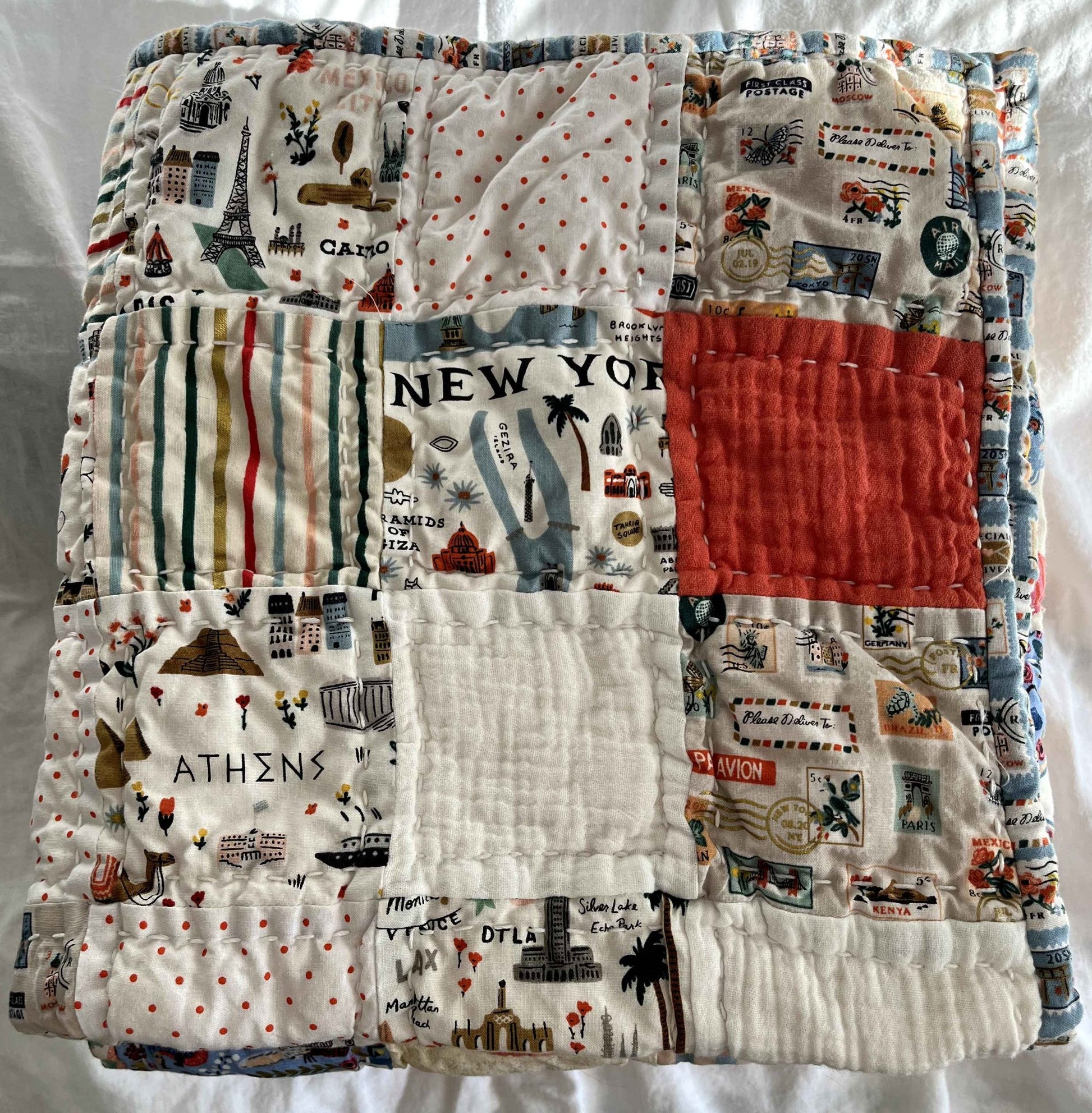 685bf416c0f3f4673dfe2462_little-traveler-quilt-multi-stripe_1788034191198.jpg