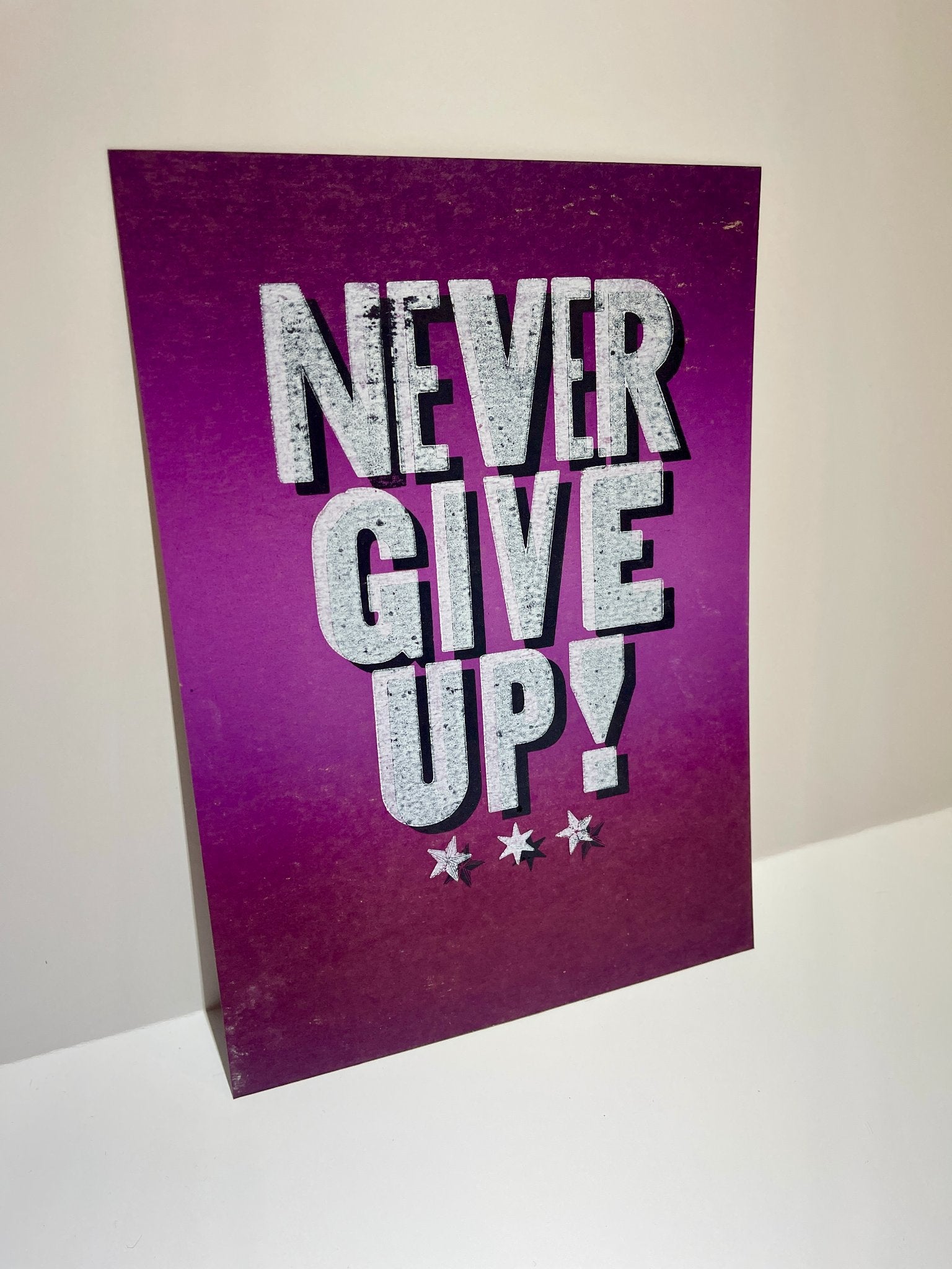 685bf416c0f3f4673dfe2462_never-give-up-purple_1780088867273.jpg