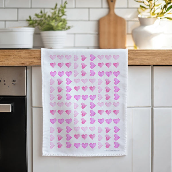 685bf416c0f3f4673dfe2462_tea-towel-mockup-hearts_1772043043372.jpg