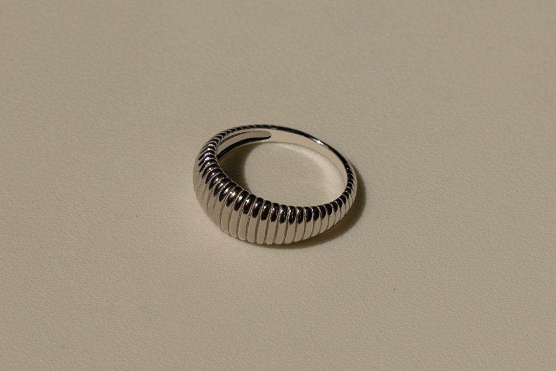 685bf416c0f3f4673dfe2462_textured-crescent-ring-2_1751498227962.jpg