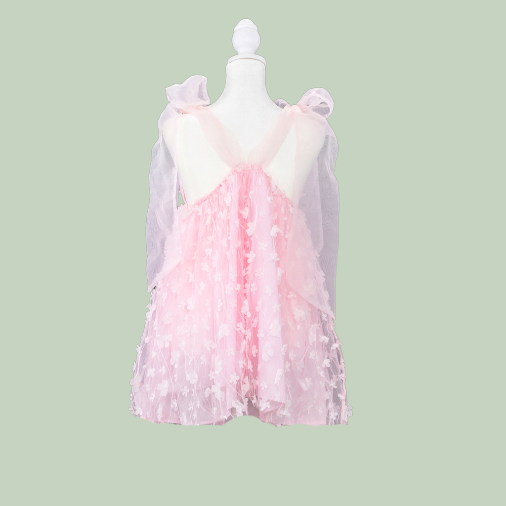 685bf416c0f3f4673dfe2462_the-mini-petal-dress-back_1778794305202.png
