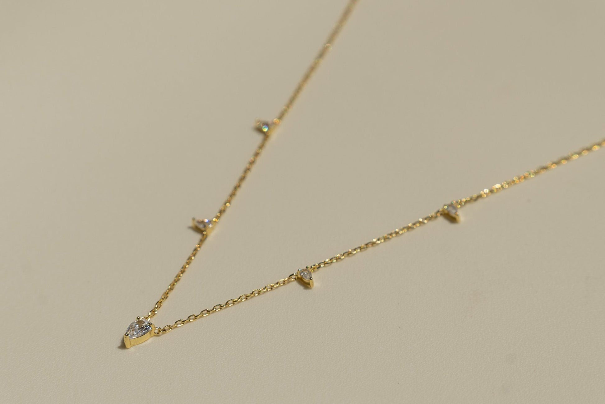 685bf416c0f3f4673dfe2462_triangle-gem-necklace-3_1751503276090.jpg