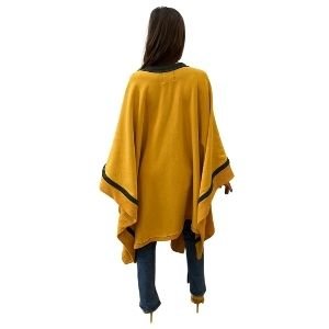 685bf416c0f3f4673dfe2462_vintage-terry-bow-poncho-3-_1765825907200.jpg