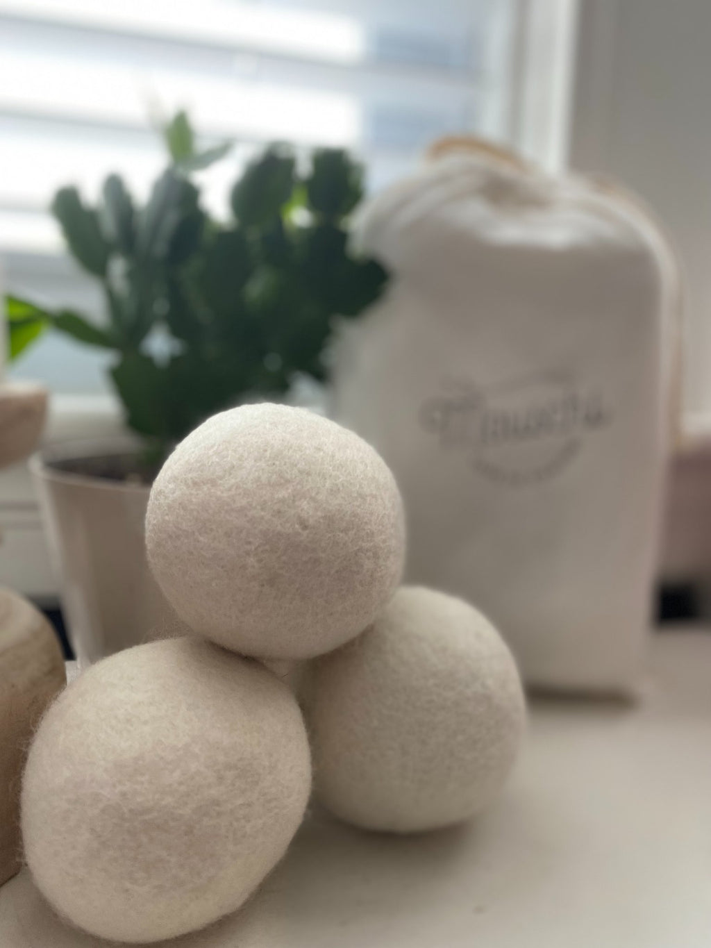 685bf416c0f3f4673dfe2462_white-dryer-balls_1759515514636.jpg